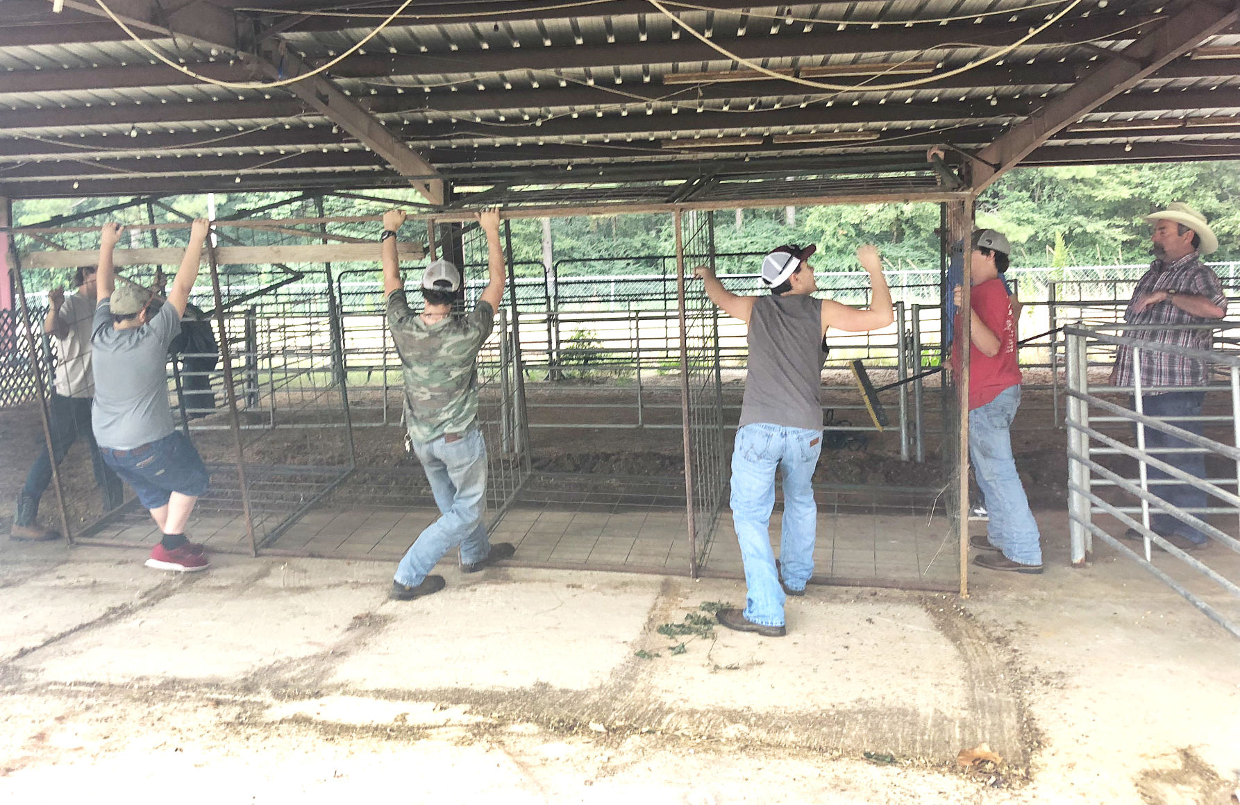 FFA members help prepare fairgrounds for county fair